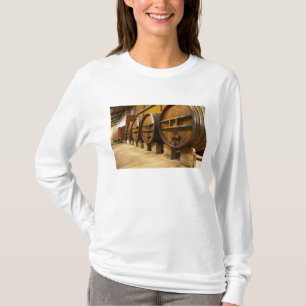 The wine cellar winery with big old wooden casks T-Shirt