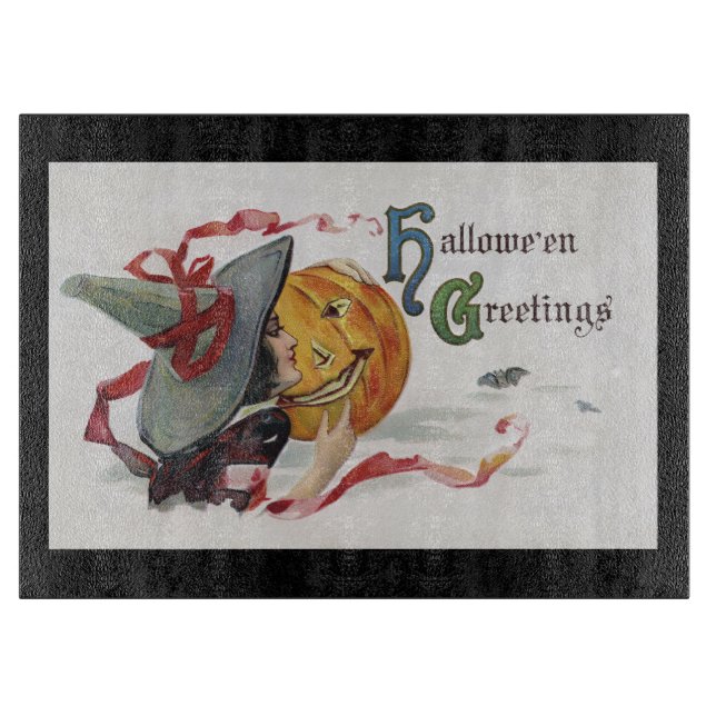 The Witch's Kiss: a Jack o Lantern on Halloween Cutting Board (Front)