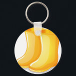 The yellow rubber boots key ring<br><div class="desc">Illustration of the yellow rubber boots on a white background</div>