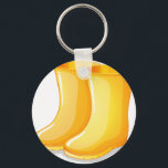 The yellow rubber boots key ring<br><div class="desc">Illustration of the yellow rubber boots on a white background</div>