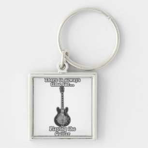 There is always time for playing the guitar. B&W Key Ring