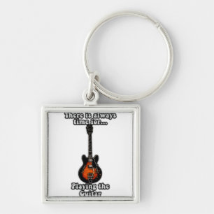 There is always time for playing the guitar. retro key ring