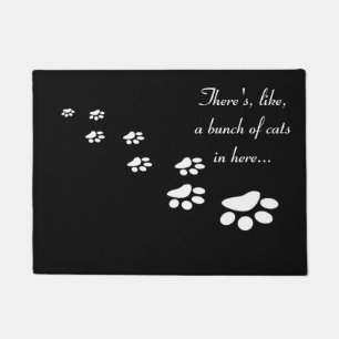 There's, like, a bunch of cats in here... doormat