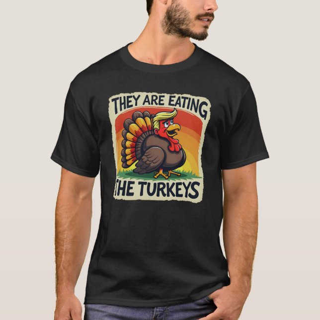 They Are Eating The Turkeys Thanksgiving Humour T-Shirt (Front)