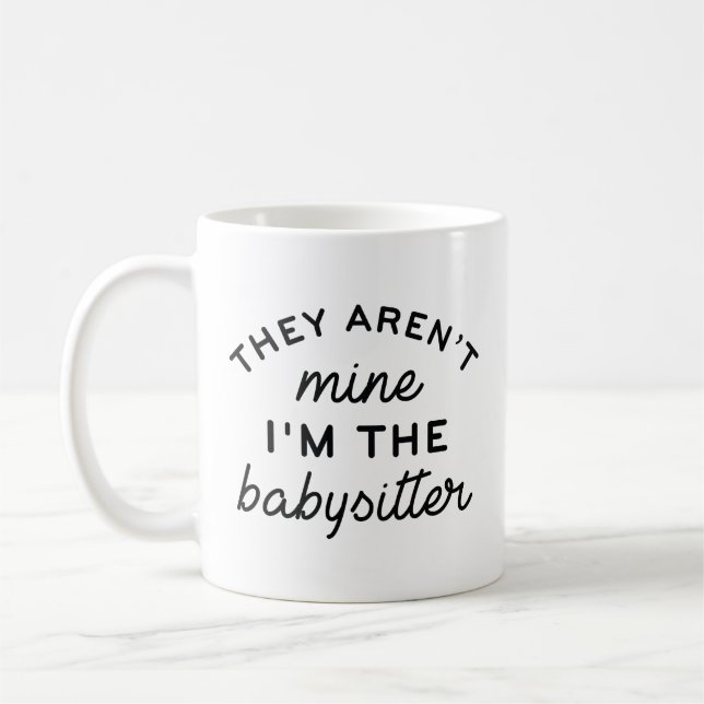 They Aren’t Mine I’m The Babysitter Coffee Mug (Left)