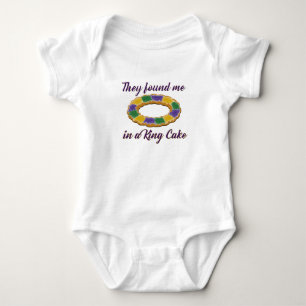 They found me in a King Cake Baby Bodysuit