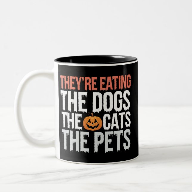 Theyre Eating The Dogs The Cats The Pets Halloween Two-Tone Coffee Mug (Left)