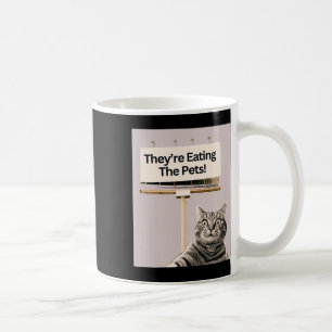 They're Eating The Pets Dogs Cats We Are Not Going Coffee Mug
