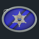 Thin Blue Line with Badge Oval Belt Buckle<br><div class="desc">This design is intended to honour the courageous men and women who protect our communities. This police,  sheriff and law enforcement symbol is beautiful graphic tribute to those who serve and those who have made the ultimate sacrifice.</div>
