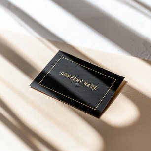 Thin gold border, gold text, black business card