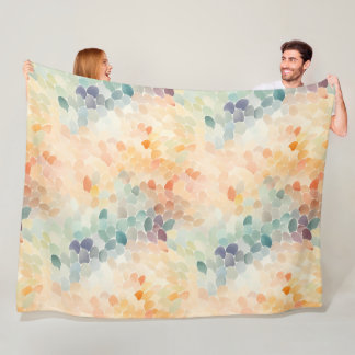 This blanket features a soft pastel abstract water