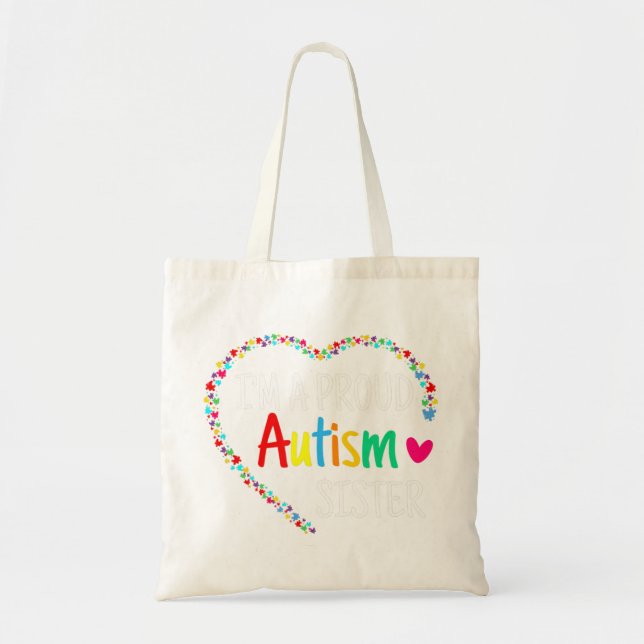 This colourful autism heart made with puzzle piece tote bag (Front)