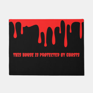 This house is protected by ghosts Spooky Halloween Doormat