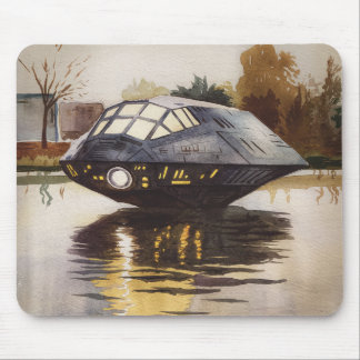 This is a spaceship waiting for a moment on the ri mouse mat