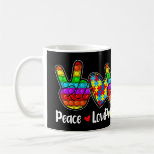 This Novelty Poppin With Sayings "Peace Love Autis Coffee Mug