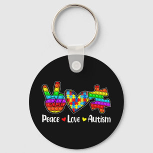 This Novelty Poppin With Sayings "Peace Love Autis Key Ring