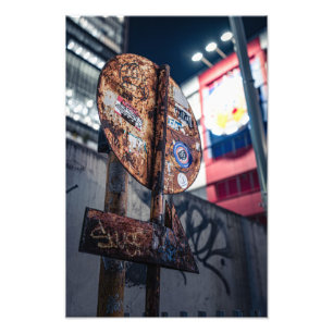This sign was photographed at night in Osaka, Japa