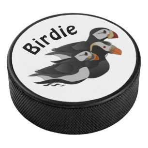 Three Adorably Friendly Puffins Swimming Cartoon Hockey Puck