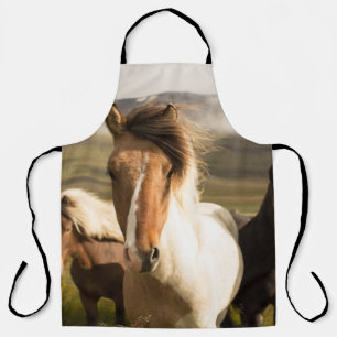 THREE ASSORTED-COLOR HORSES RUNNING AWAY FROM A MO APRON