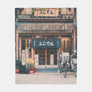 THREE BICYCLES PARKED IN FRONT OF BUILDING FLEECE BLANKET