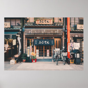 THREE BICYCLES PARKED IN FRONT OF BUILDING POSTER
