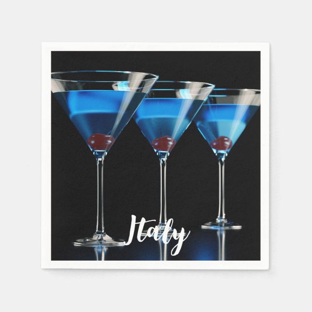 Three blue cocktails with cherry on black napkin (Front)