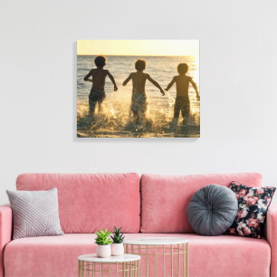 Three Boys Running into an Ocean Canvas Print