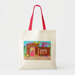 Three Cats at an Adobe Gingerbread House Tote Bag