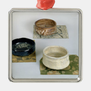 Three chawans used for tea ceremonies, c.1800 metal tree decoration
