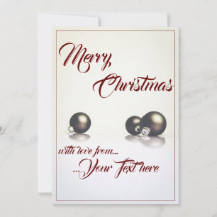 Three christmas balls in front of light background