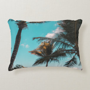Three coconut trees on seashore decorative cushion