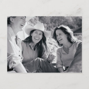 Three cowgirls laughing together postcard