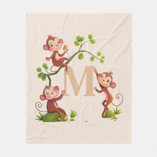 Three Cute Monkeys and Golden Monogram on Ivory Fleece Blanket