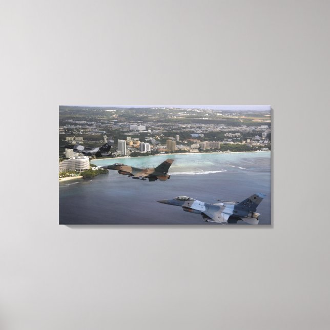 Three F-16 Fighting Falcons fly in formation Canvas Print (Front)