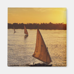 Three falukas with sightseers on Nile River at Magnet