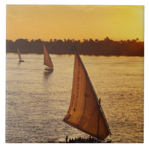 Three falukas with sightseers on Nile River at Tile