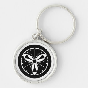Three ginkgo leaves with swords in circle key ring