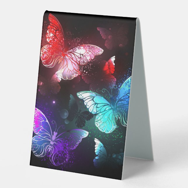 Three Glowing Butterflies on night background (Front)