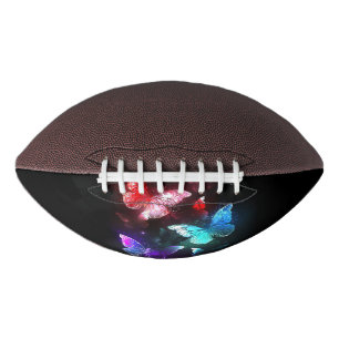 Three Glowing Butterflies on night background American Football