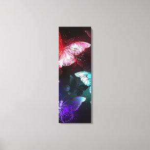 Three Glowing Butterflies on night background Canvas Print