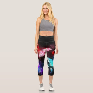 Three Glowing Butterflies on night background Capri Leggings