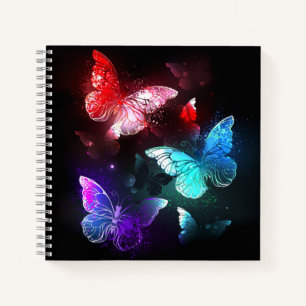 Three Glowing Butterflies on night background Notebook