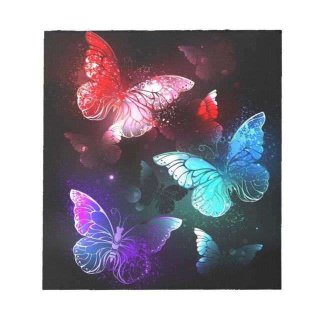 Three Glowing Butterflies on night background Notepad (Front)