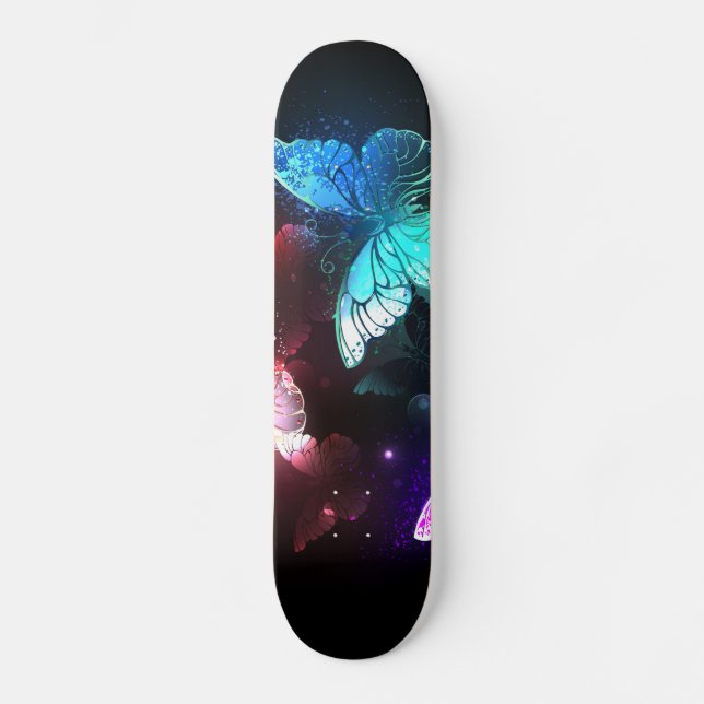 Three Glowing Butterflies on night background Skateboard (Front)