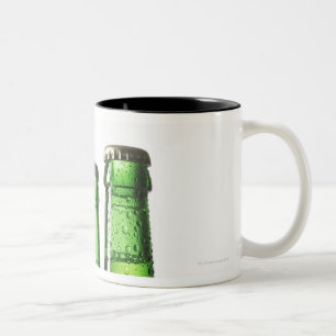 Three green bottles of beer on white background, Two-Tone coffee mug