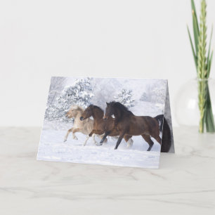 Three Horses Run in the Snow Greeting Card