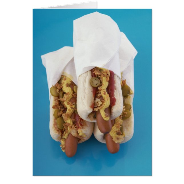 Three hot dogs in buns (Front)