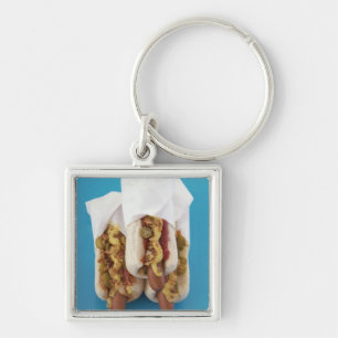 Three hot dogs in buns key ring