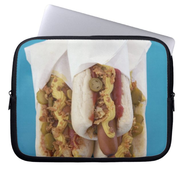 Three hot dogs in buns laptop sleeve (Front)