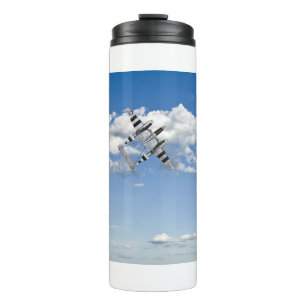 Three Lockheed P-38s flying in a cloudy sky. Thermal Tumbler